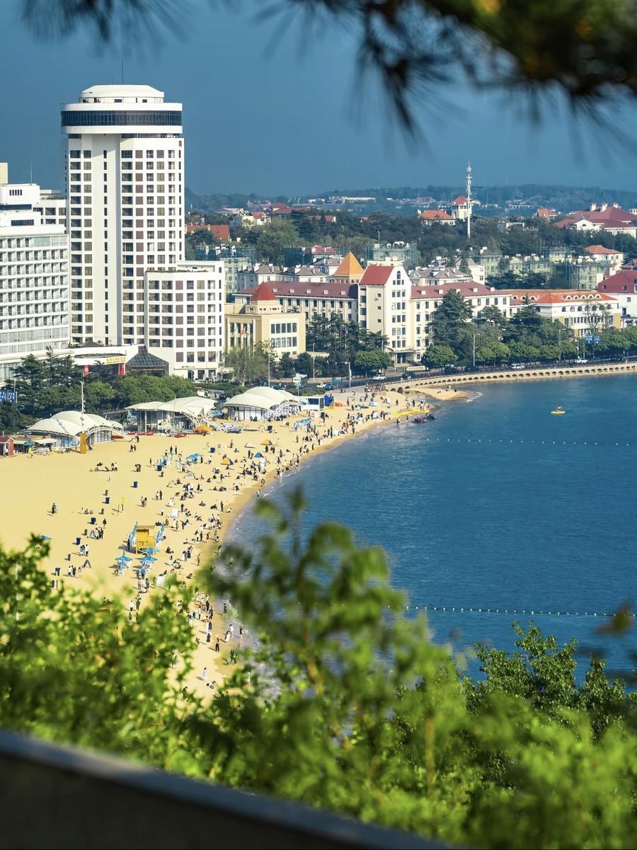 A golden sand beach and blue bay in Qingdao